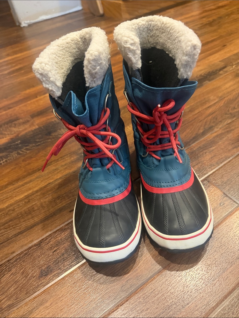 Sorel Blue and Black Winter Boots with Red Laces